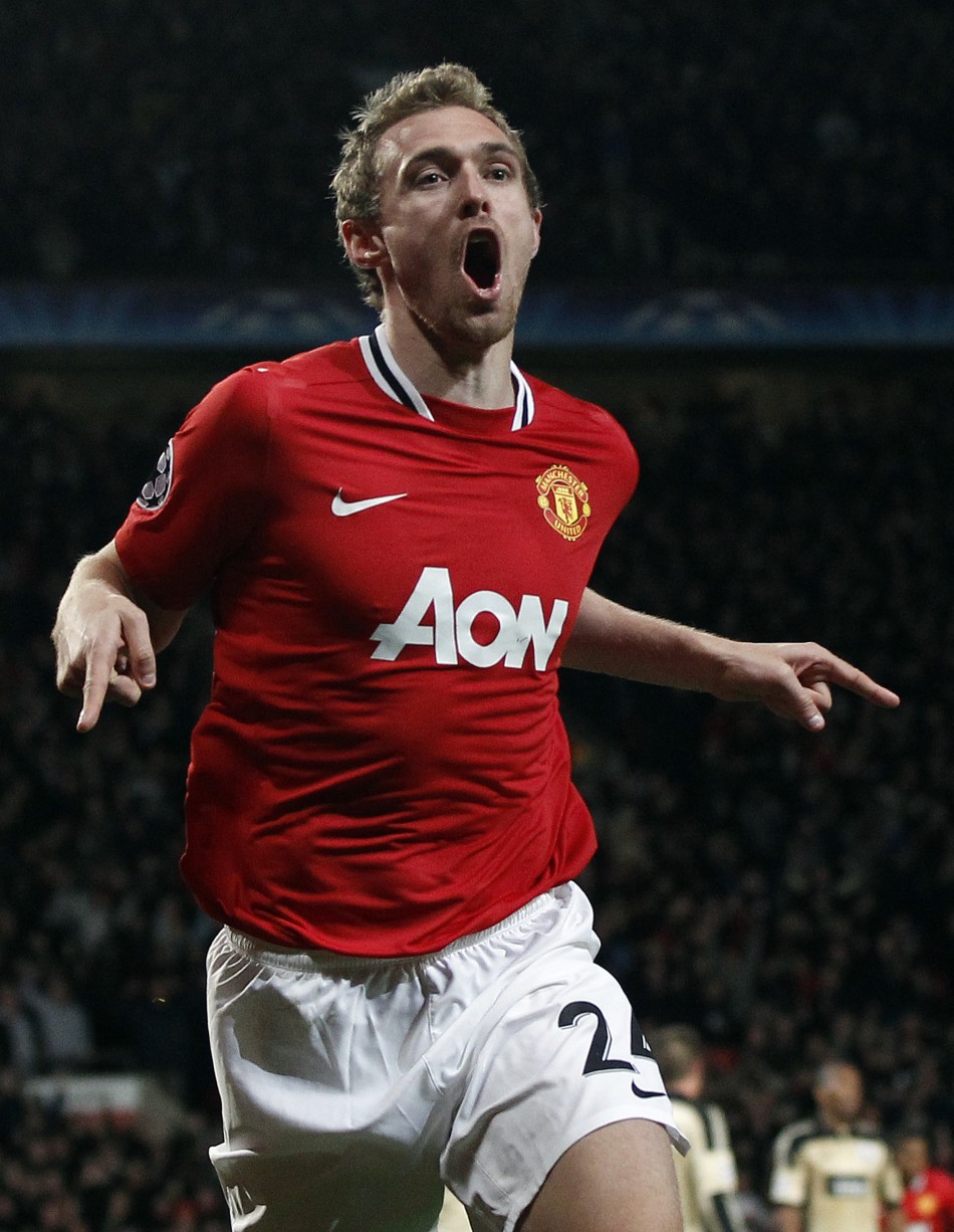 Manchester Uniteds Fletcher celebrates his goal against Benfica during their Champions League soccer match in Manchester