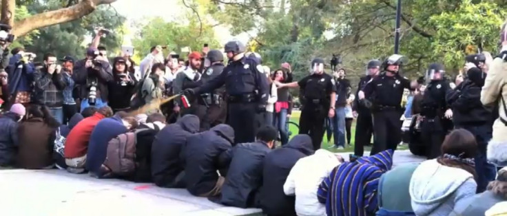 Officials at the University of California have said they will pay the medical expenses of the students who were pepper spared during an Occupy Davis protest last week.