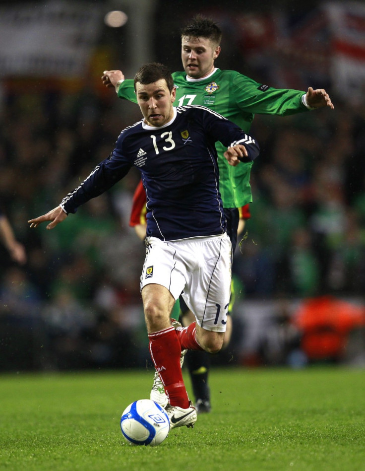 Northern Ireland&#039;s Oliver Norwood challenges Scotland&#039;s James McArthur during their Nations Cup soccer match at the Aviva Stadium in Dublin