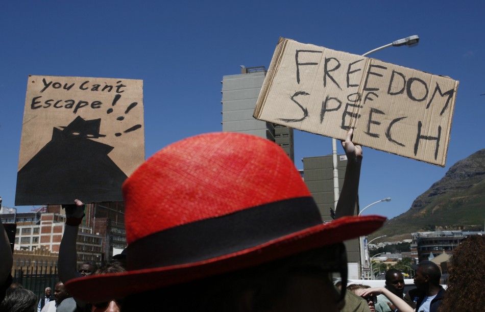 Demonstrators protest against the passing of the Protection of Information Bill outside Parliament in Cape Town