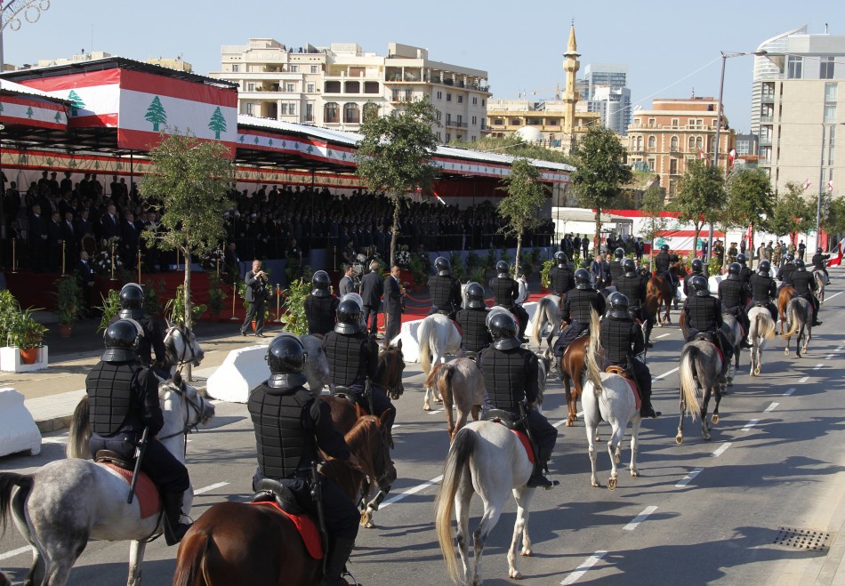 Security forces ride horses as they take part in a military parade to celebrate the 68th anniversary of Lebanons independence day in Beirut