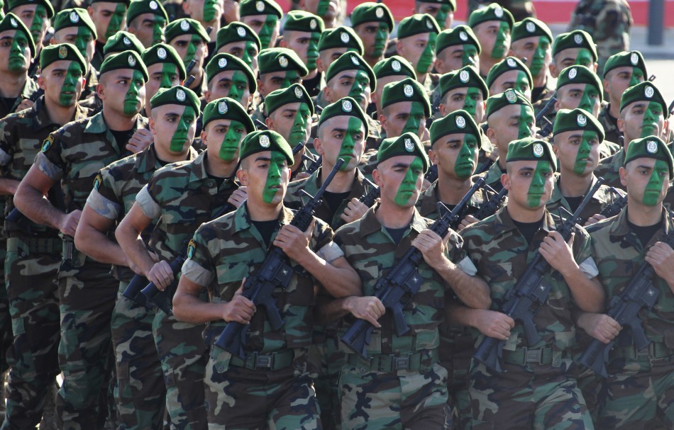 Soldiers take part in a military parade to celebrate the 68th anniversary of Lebanons independence day in downtown Beirut