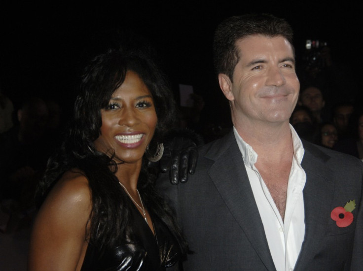 Singer Sinitta and Simon Cowell pose at the &quot;National Television Awards&quot; in London