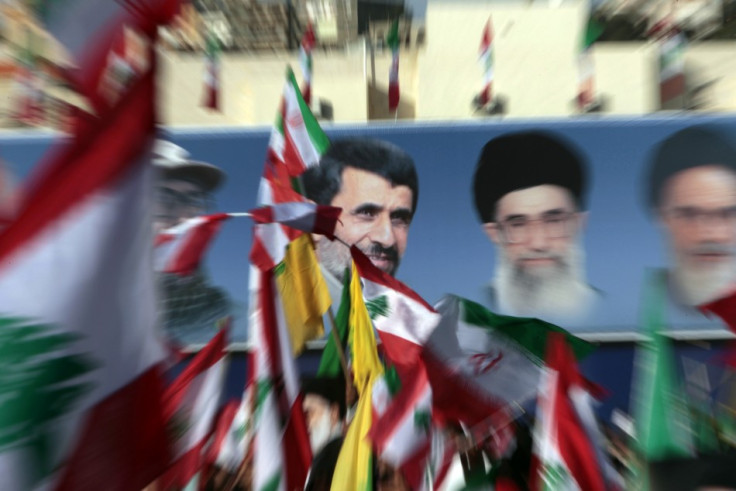 Lebanon&#039;s Hezbollah celebrate the visit of Iranian President Mahmoud Ahmadinejad during a rally in the south Lebanese town of Bint Jbeil