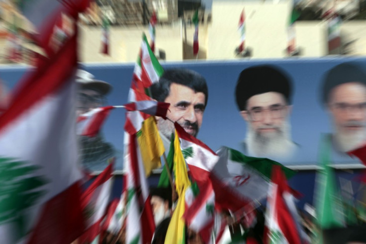 Lebanon's Hezbollah celebrate the visit of Iranian President Mahmoud Ahmadinejad during a rally in the south Lebanese town of Bint Jbeil