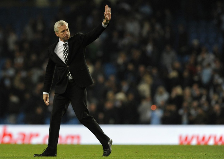 Newcastle United&#039;s coach Pardew reacts after their English Premier League soccer match against Manchester City in Manchester