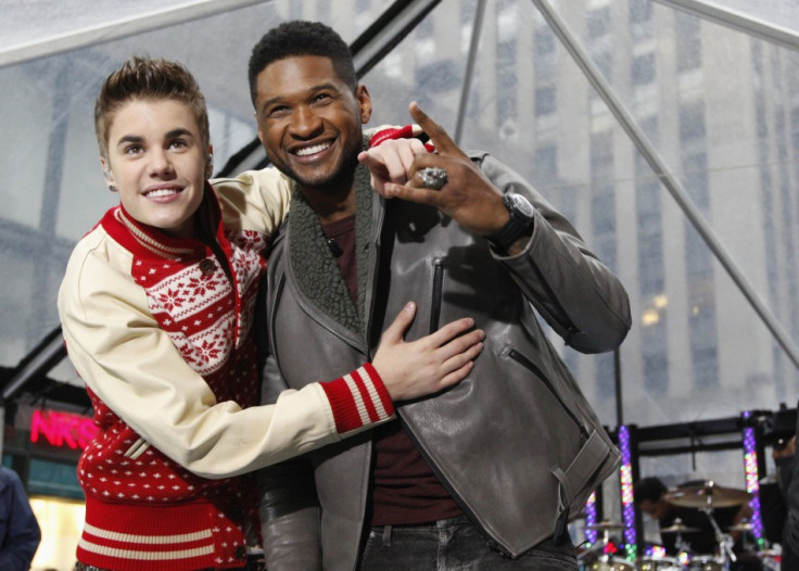 Singers Justin Bieber and Usher  pose together after performing on NBC's &quot;Today&quot; show in New York