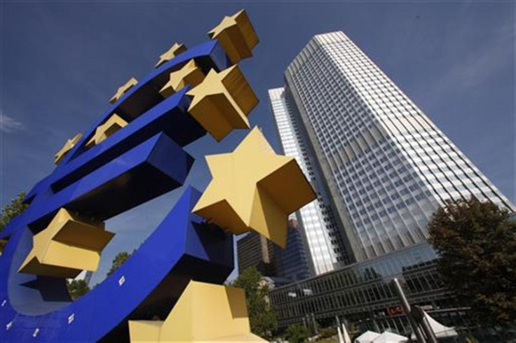 A huge Euro logo is pictured past the headquarters of the European Central Bank (ECB) in Frankfurt