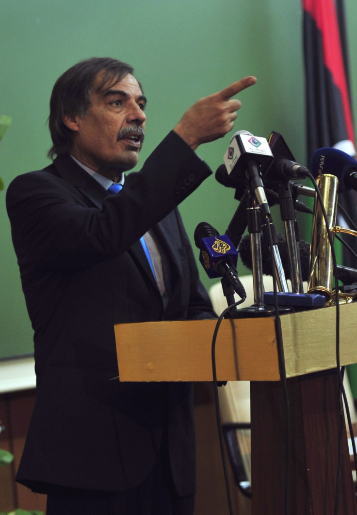 Ali Tarhouni, Libyan National Transitional Council&#039;s minister for oil and finance, attends a news conference in Benghazi