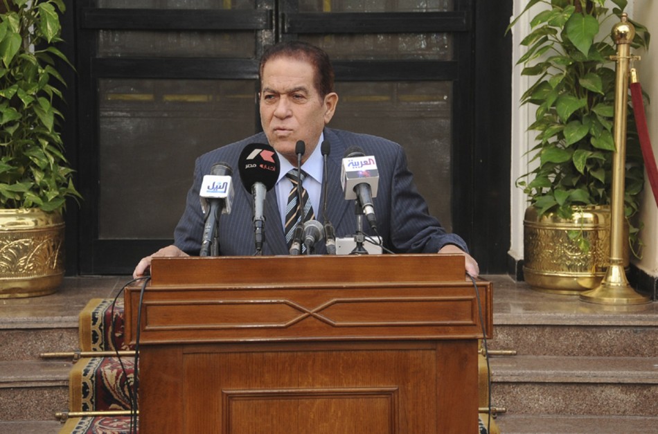 Egyptian new Prime Minister Kamal Ganzouri speaks at a news conference at the Defense Ministry in Cairo
