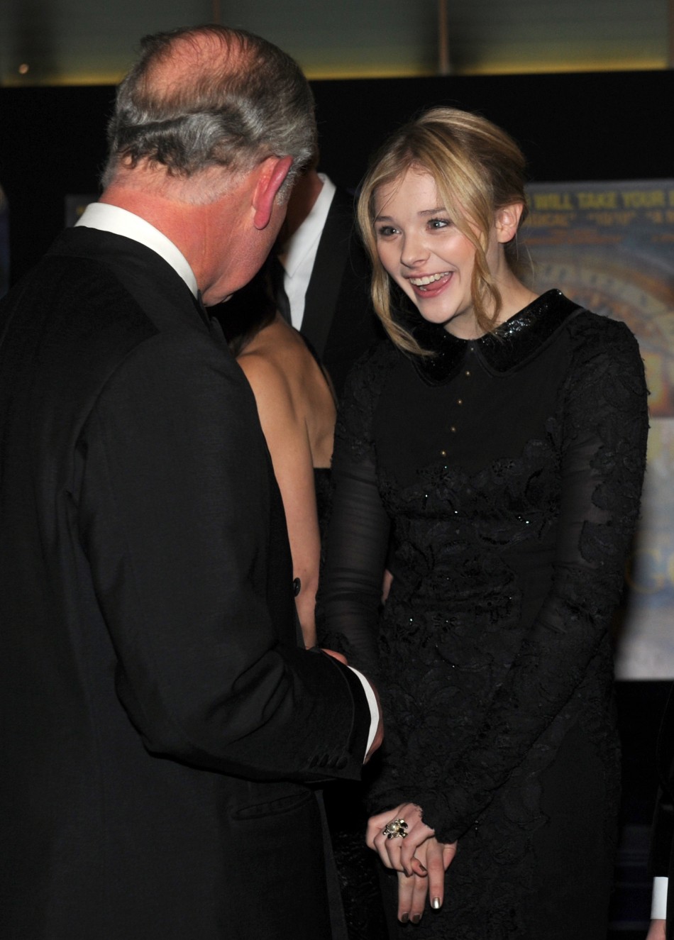 Britain039s Prince Charles meets actor Chloe Moretz as they attendThe Royal Premiere of director Martin Scorsese039s film Hugo at the Odeon Leicester Square cinema in London