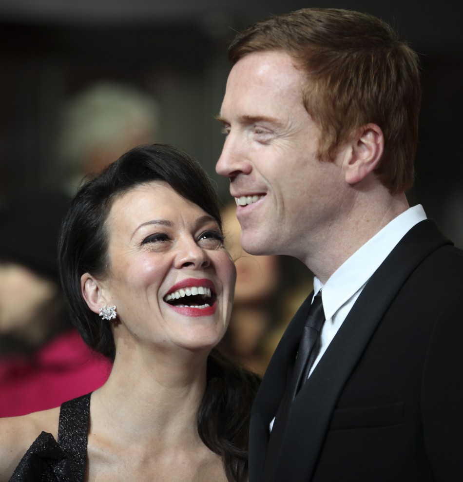 Actors Helen McCrory and Damien Lewis arrive at The Royal Premiere of Hugo at the Odeon Leicester Square cinema in London