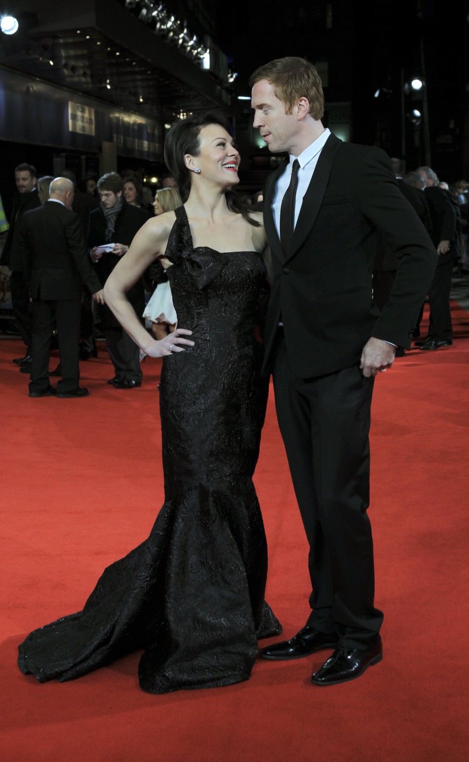 Actors Helen McCrory and Damien Lewis arrive at The Royal Premiere of director Martin Scorseses film Hugo at the Odeon Leicester Square cinema in London