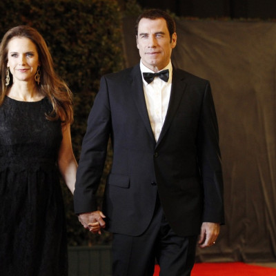 Actors Kelly Preston (L) and John Travolta (R)