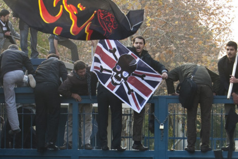 Iranian protesters try to enter the British embassy in Tehran