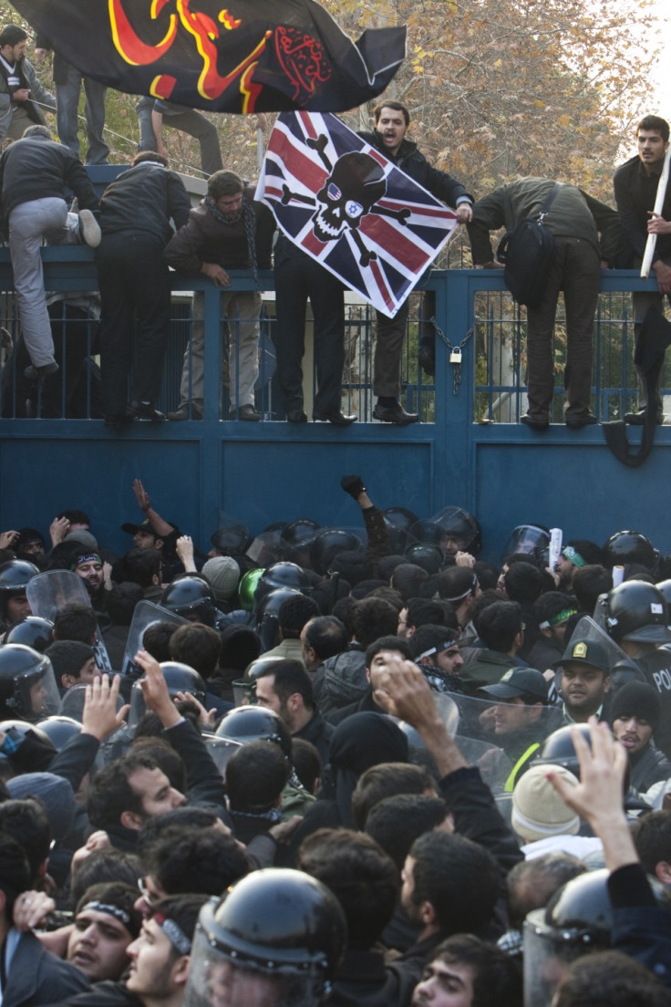 Iranian protesters try to enter the British embassy in Tehran