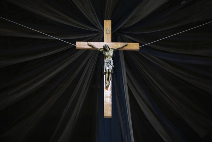 A crucifix hangs inside a Roman Catholic cathedral in the capital Pristina