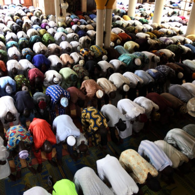 Muslim faithful attend Friday prayers at the Central mosque in Nigeria&#039;s commercial capital Lagos
