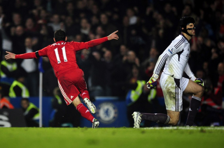 Liverpool&#039;s Maxi Rodriguez celebrates after scoring a goal as Chelsea&#039;s Cech reacts during their English Premier League soccer match at Stamford Bridge in London
