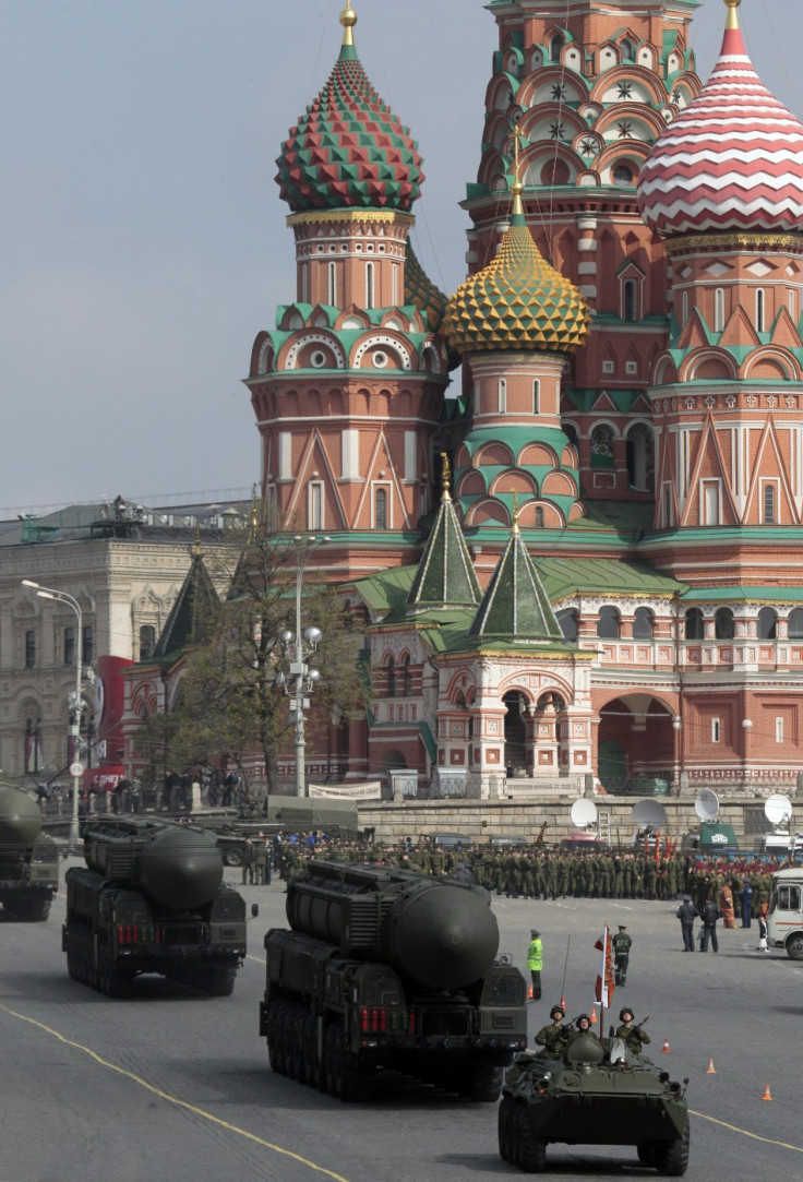 Russian Topol M ballistic missiles on launchers are seen during May Day parade rehearsals in front of St. Basil&#039;s cathedral on Moscow&#039;s Red Square May 7, 2011. Russia will celebrate the 66th anniversary of victory over Nazi Germany on May 9