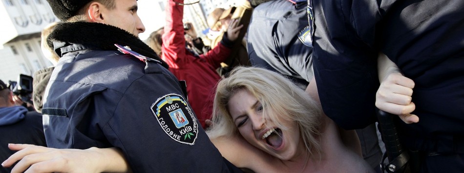 Police arrived at the stadium within five minutes of the protest starting and dragged the woman into police vehicles and drove away. Police arrived at the stadium within five minutes of the protest starting and dragged the woman into police vehicles and drove away.