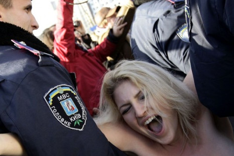 Police arrived at the stadium within five minutes of the protest starting and dragged the woman into police vehicles and drove away.