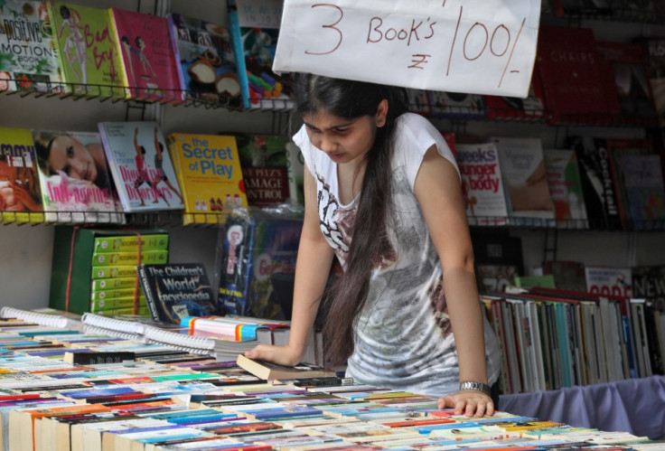 Girl looking at books