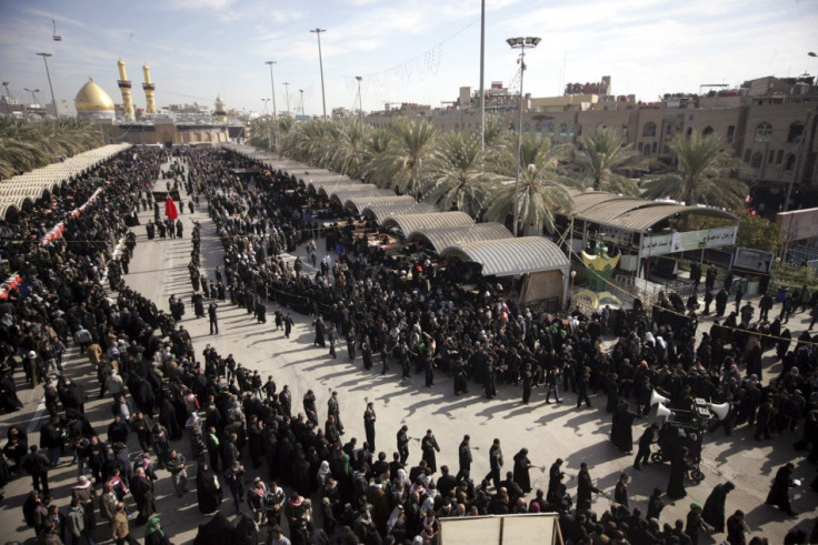 Shi'ite pilgrims take part in the preparations of the Ashura ceremony in Kerbala