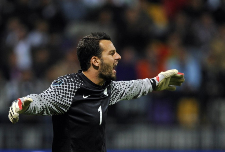 Slovenia&#039;s Handanovic reacts during their Euro 2012 Group C qualifying soccer match against Serbia in Maribor