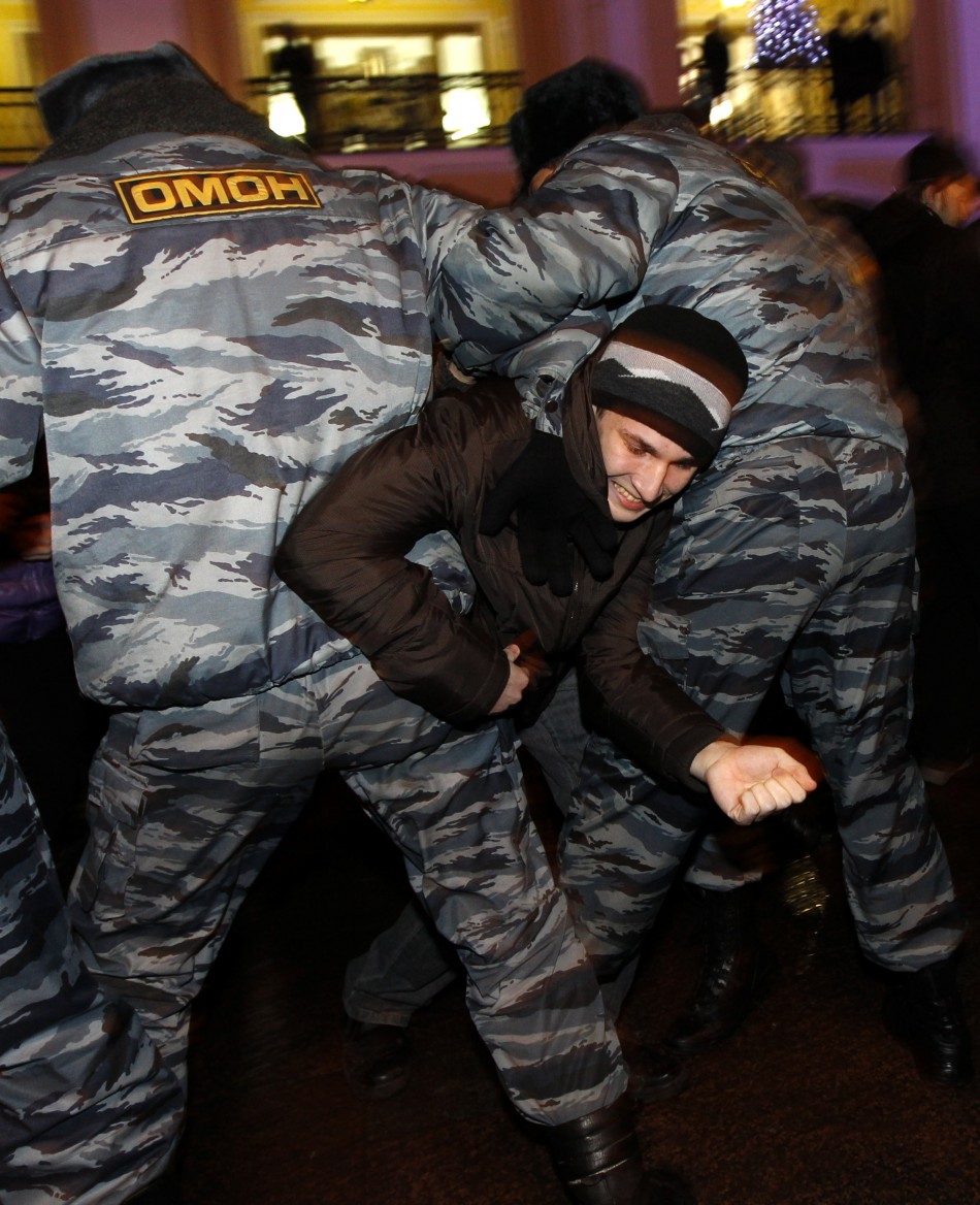 Russian Interior Ministry troops detain a participant