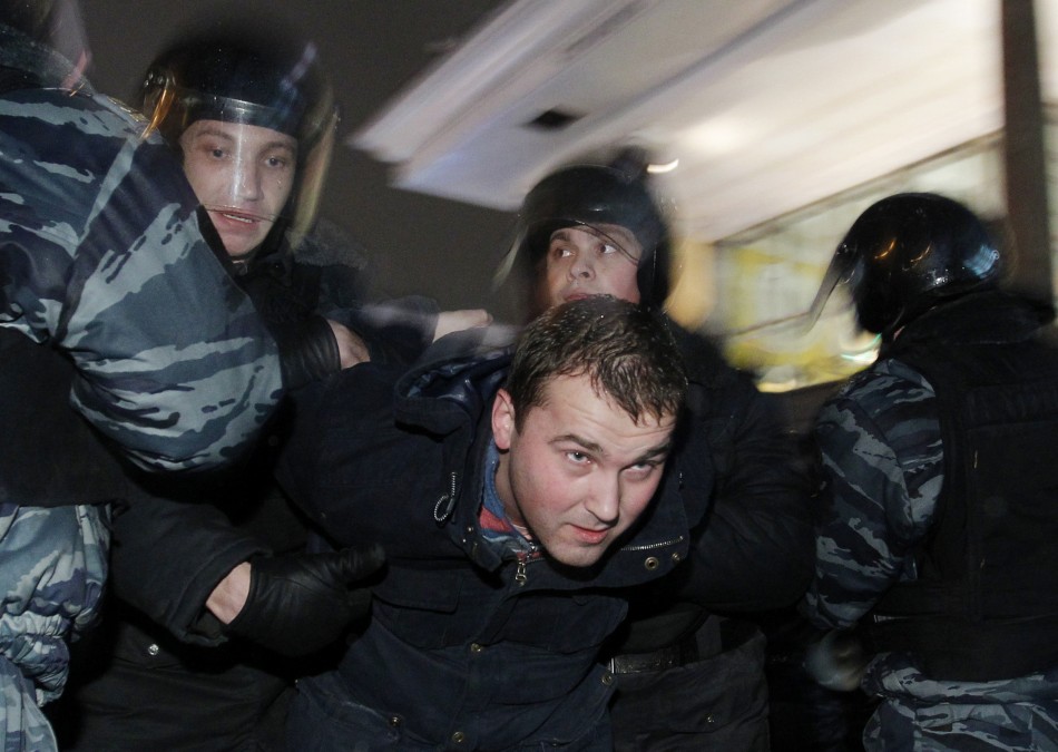 Russian police detain a participant