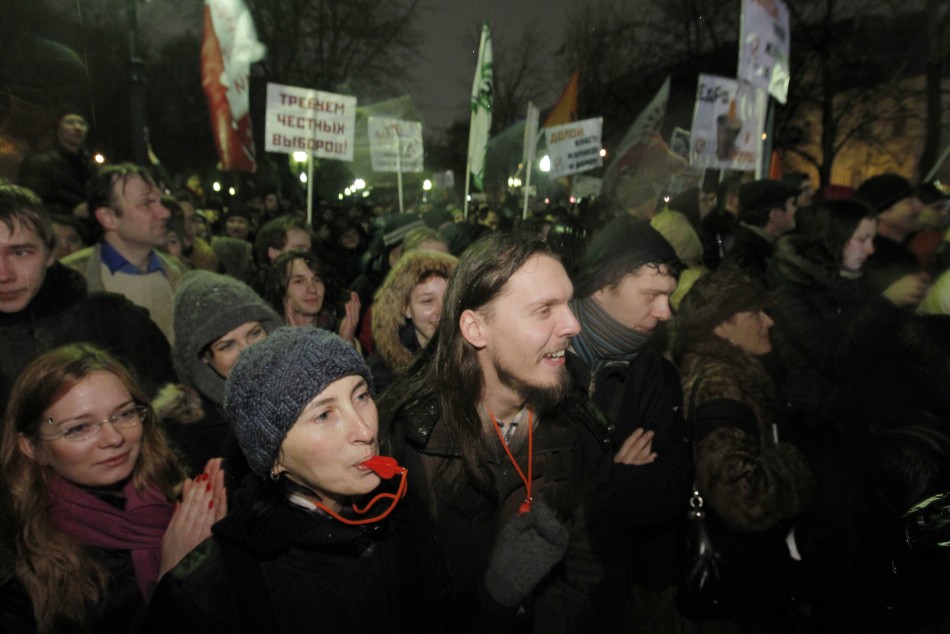 Participants blow whistles and shout during an opposition protest in central Moscow December 5, 2011.