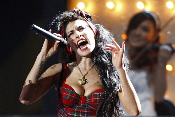 File photo of British singer Amy Winehouse performing at the Brit Awards at Earls Court in London