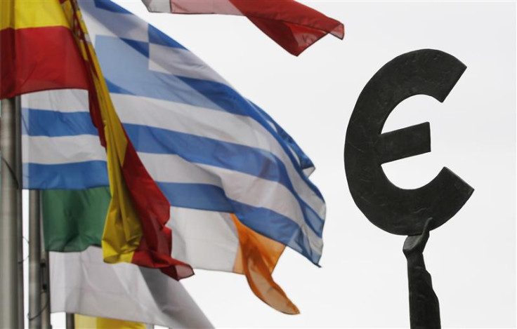 File photo of Greek and others European national flags fluttering near an euro symbol outside the EU Parliament in Brussels