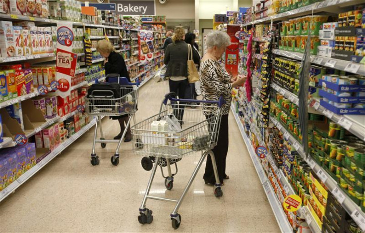 Customers shop for groceries in a supermarket in London