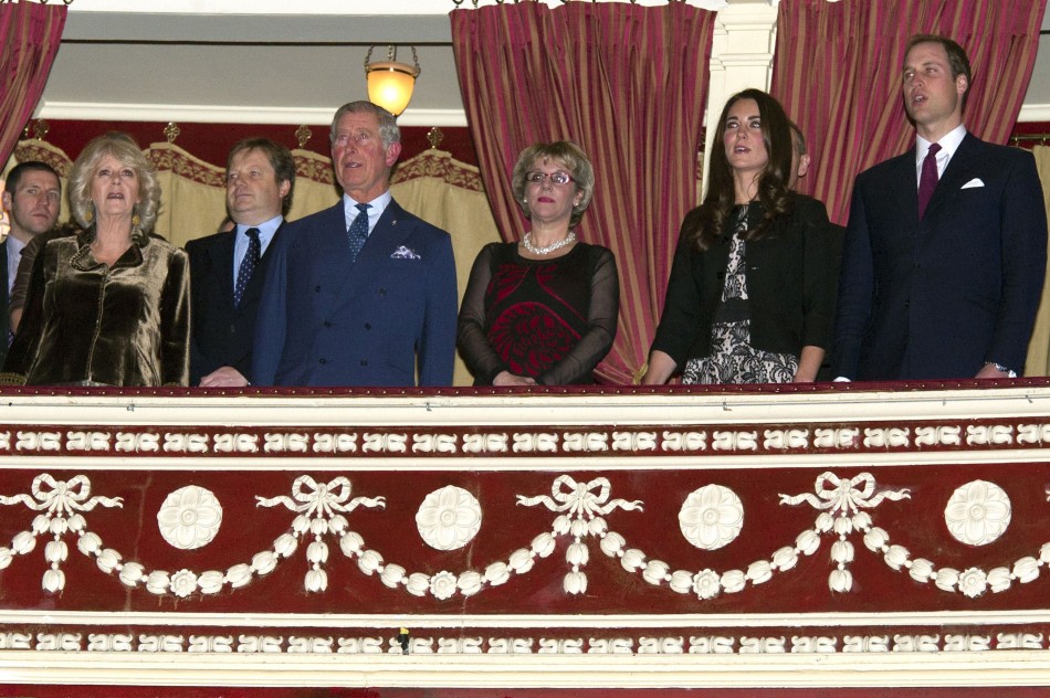 Prince William R and Catherine, Duchess of Cambridge 2nd R attend a fund raising concert with Prince Charles and Camilla, Duchess of Cornwall at the Royal Albert Hall in London on December 6, 2011.