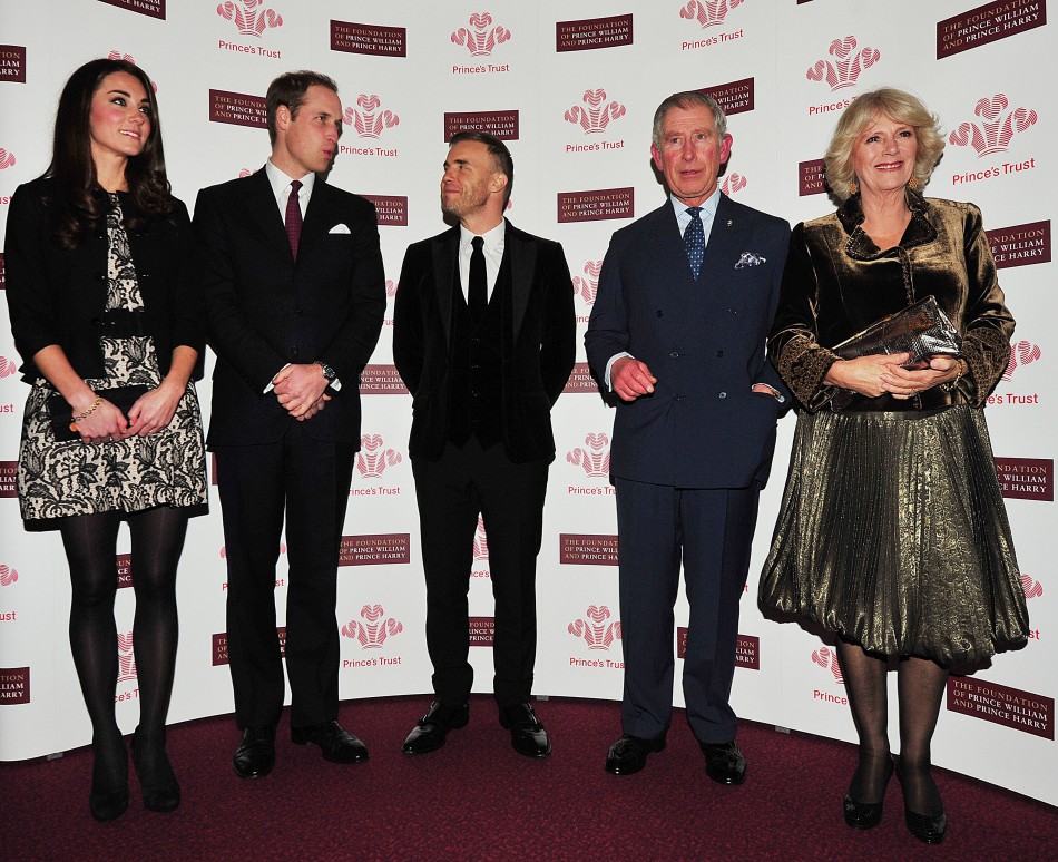 Britains Prince William and Kate Middleton, Duchess of Cambridge pose with singer Gary Barlow, Prince Charles and Camilla, Duchess of Cornwall ahead of a fund-raising concert at the Royal Albert Hall in London.