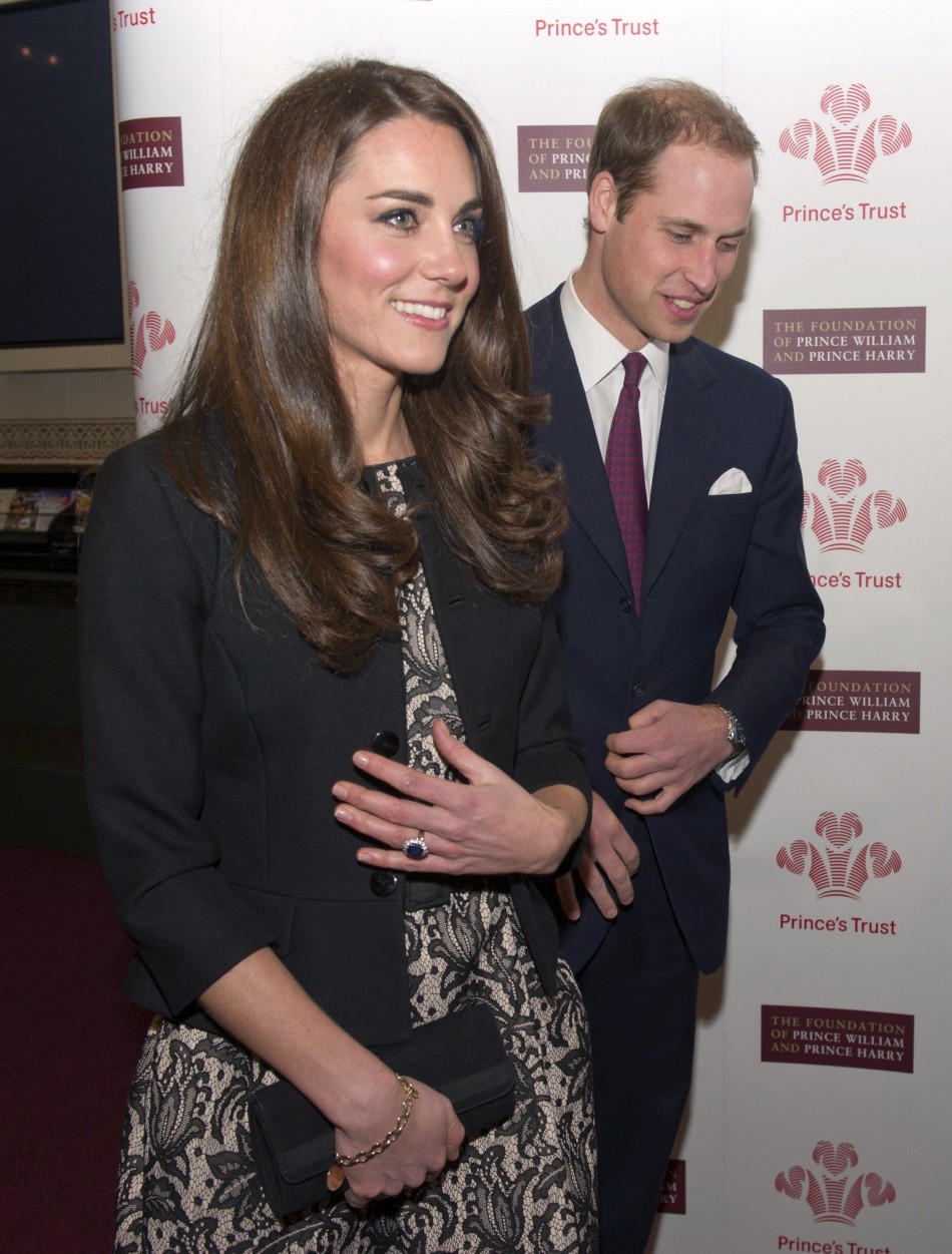 Britains Prince William and Kate Middleton, Duchess of Cambridge L Arrive at a fund-raising concert at the Royal Albert Hall in London December 6, 2011.