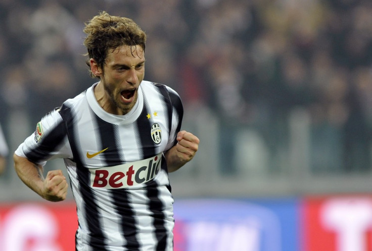 Juventus' Marchisio celebrates after scoring against Cesena during their Italian Serie A soccer match at the Arena stadium in Turin