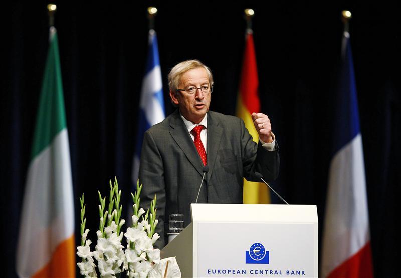 Chairman of the Euro group Junker delivers his speech during a farewell ceremony for outgoing head of ECB Trichet in Frankfurt