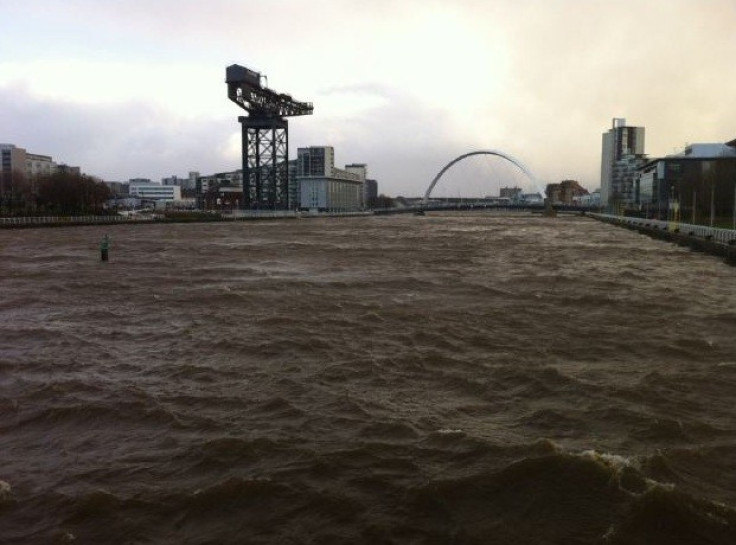 strong winds have caused the River Clyde in Glasgow to overflow and break its bank.