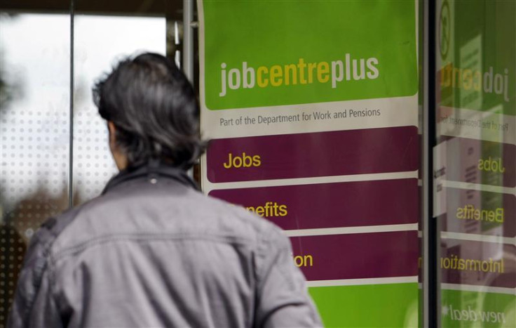A man enters a Job Center in London