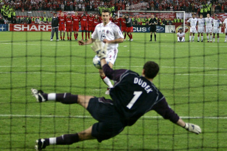 Liverpool&#039;s goalkeeper Dudek stops a penalty shot from AC Milan&#039;s Shevchenko during their Champions Final in 2005