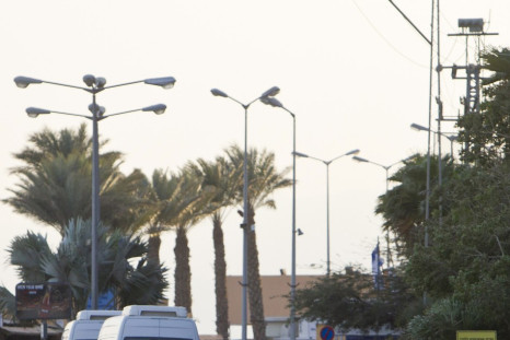 Israeli Prison Authority vehicles transporting Egyptian prisoners cross through the border crossing next to the Egyptian Red Sea resort of Taba