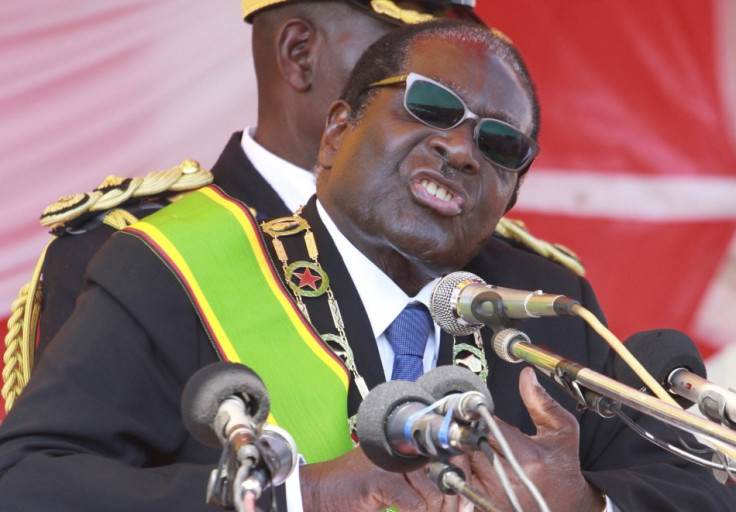 Zimbabwe&#039;s President Robert Mugabe addresses supporters at a Heroes Day rally in the capital Harare