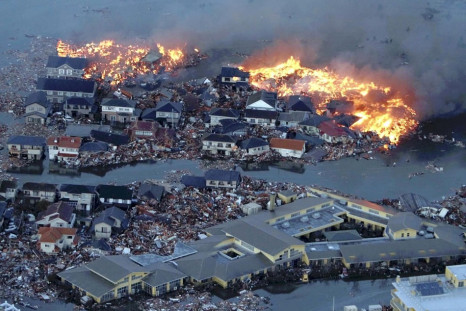 Houses swept out to sea burn