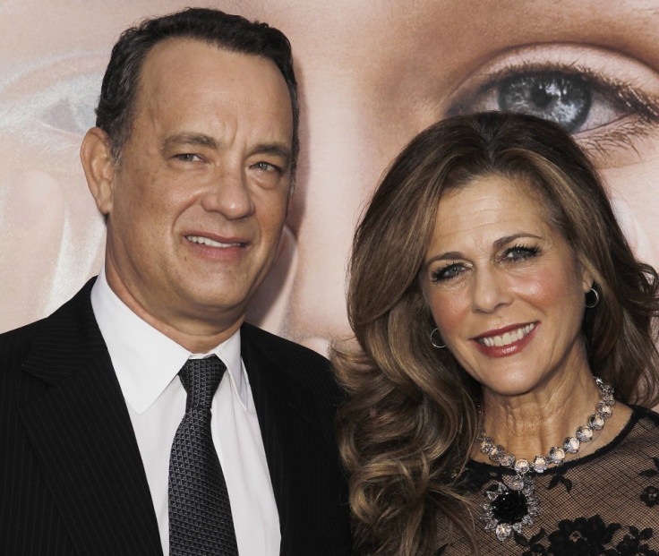 Cast member Tom Hanks (L) and his wife Rita Wilson arrive for the premiere of the film &quot;Extremely Loud and Incredibly Close&quot; in New York