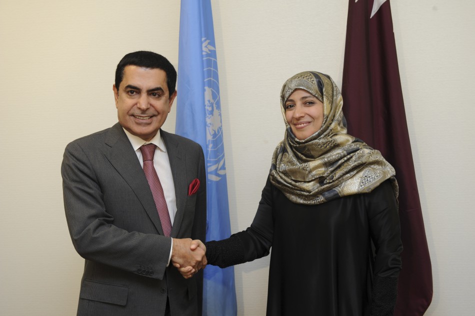 President of the UN General Assembly Al-Nasser shakes hands withTawakkol Karman, the first Arab woman to receive the Nobel Peace Prize