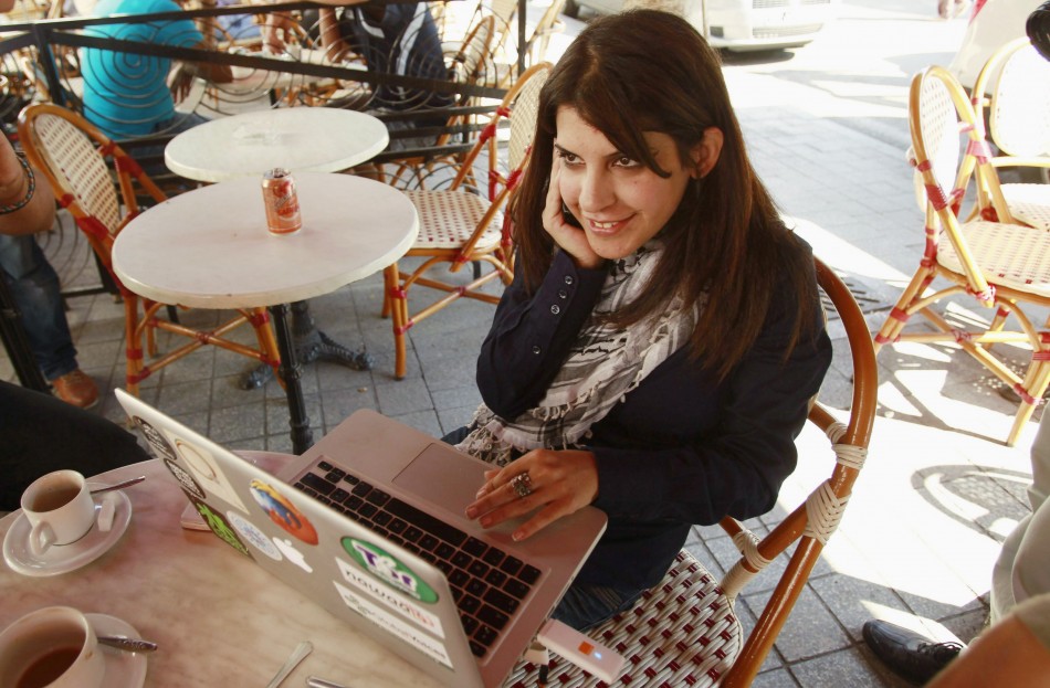 Tunisian blogger Lina Ben Mhenni, who has been tipped for the 2011 Nobel Peace Prize, works on her computer at a cafe in Tunis