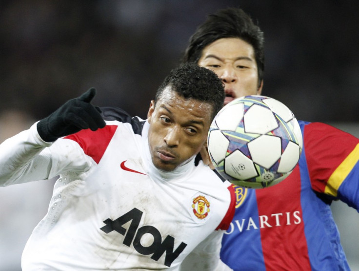 FC Basel&#039;s (FCB) Park Joo Ho (R) fights for the ball with Nani of Manchester United
